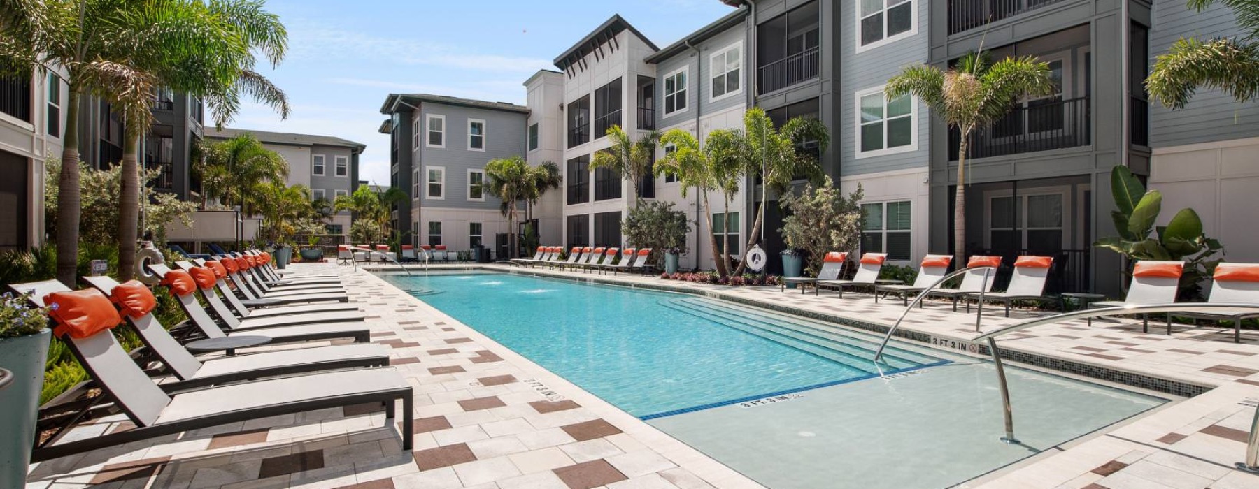 resort-style swimming pool at Bainbridge Nona North Apartments in Orlando, FL