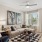 a living room with a couch and a fan at Bainbridge Nona North in Orlando, FL